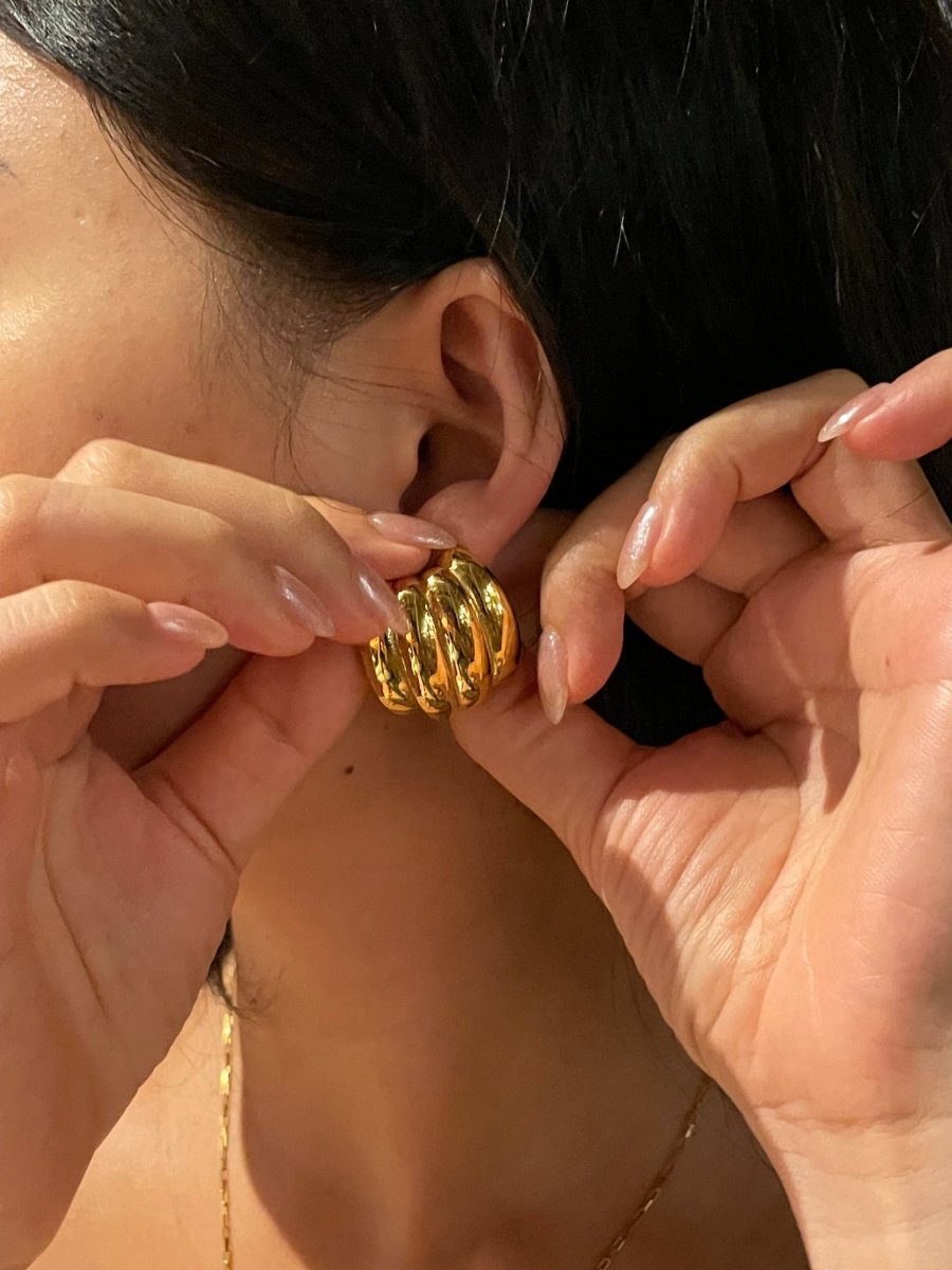 Model  in Callie Bold Statement Gold Studs- 18K Gold Plated