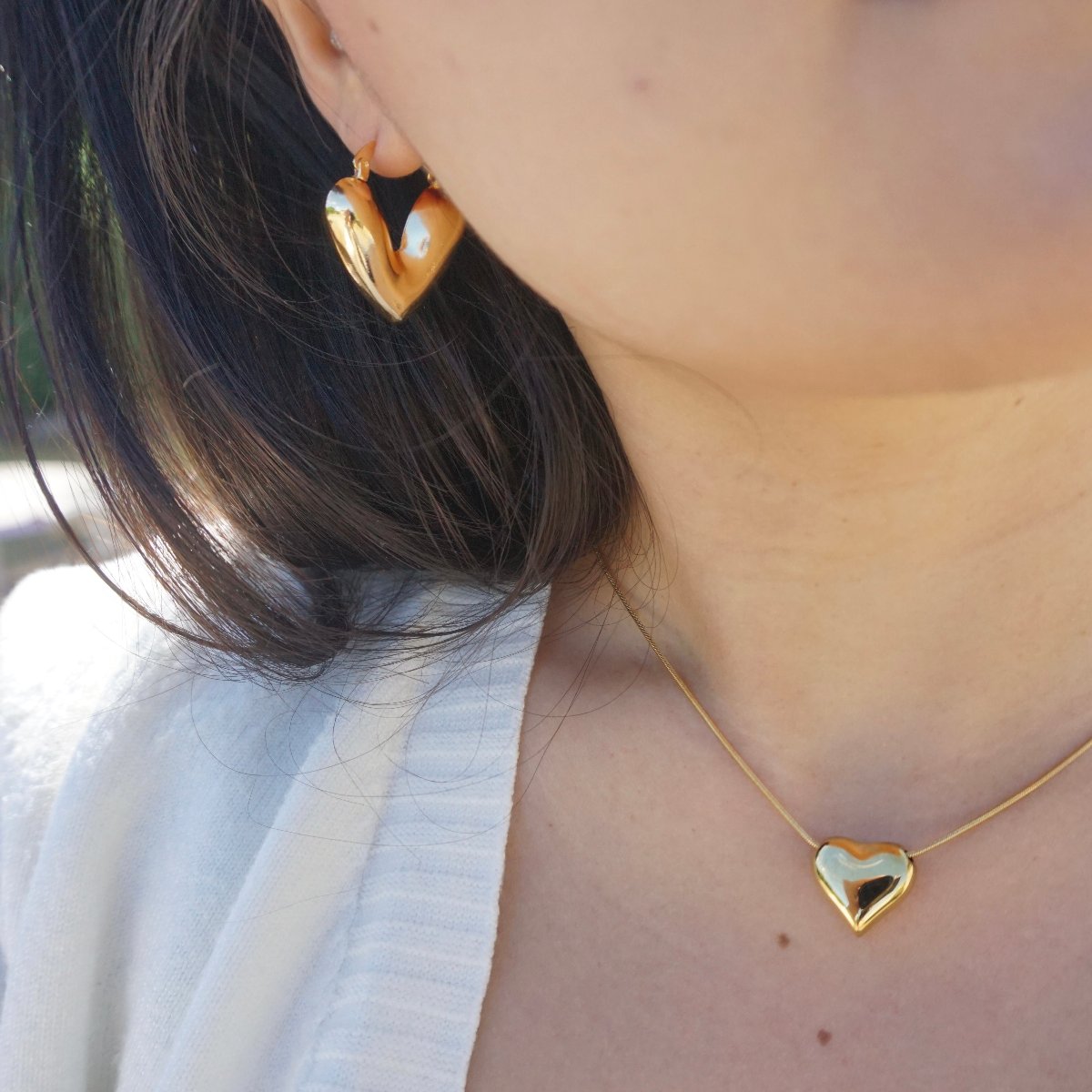 Model in Candy Statement Heart Shape Earrings - 18K Gold Plated