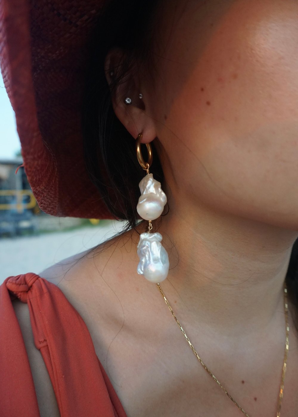 Model in Aelia Double Big Baroque Pearls Earrings