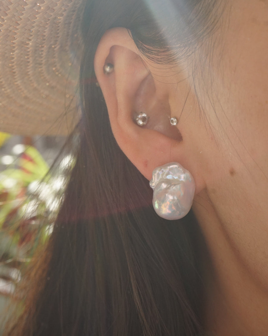 model in large_high lustrous baroque_pearl_stud_earrings