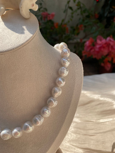 Allure of Round Freshwater Baroque Pearl